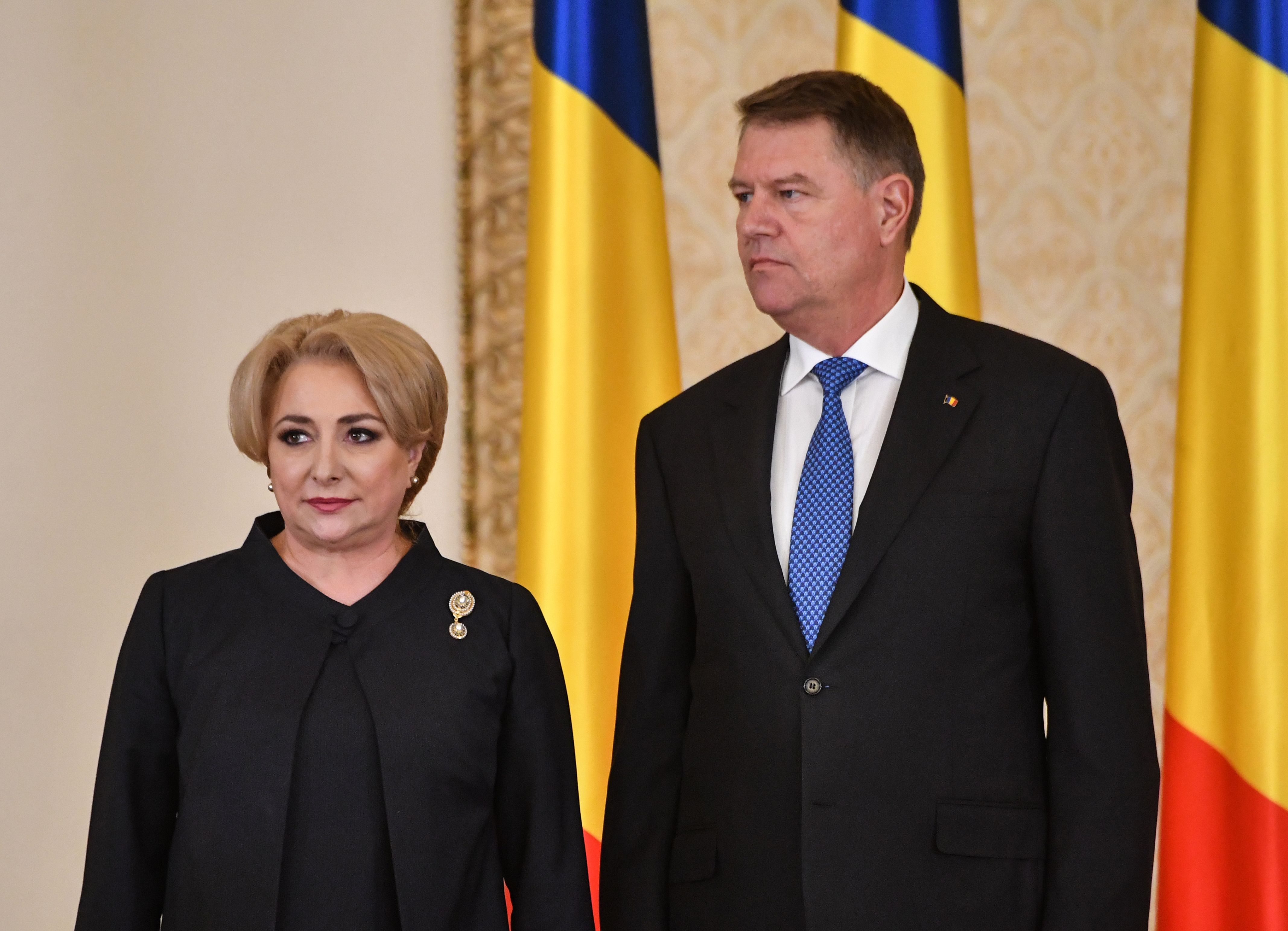 Romanian Prime Minister Viorica Dancila (L) and President Klaus Iohannis (R) at the swearing-in ceremony at the Cotroceni palace, the Romanian Presidency headquarters in Bucharest January 29, 2018 / AFP PHOTO / Daniel MIHAILESCU        (Photo credit should read DANIEL MIHAILESCU/AFP/Getty Images)